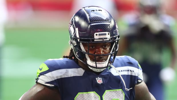 Jan 3, 2021; Glendale, Arizona, USA; Seattle Seahawks defensive tackle Jarran Reed (90) against the San Francisco 49ers at State Farm Stadium. Mandatory Credit: Mark J. Rebilas-USA TODAY Sports  